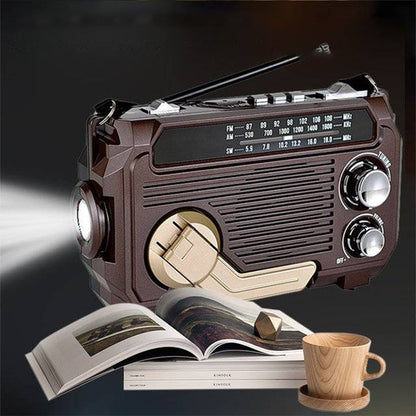 Radio portátil multifunción con manivela y linterna